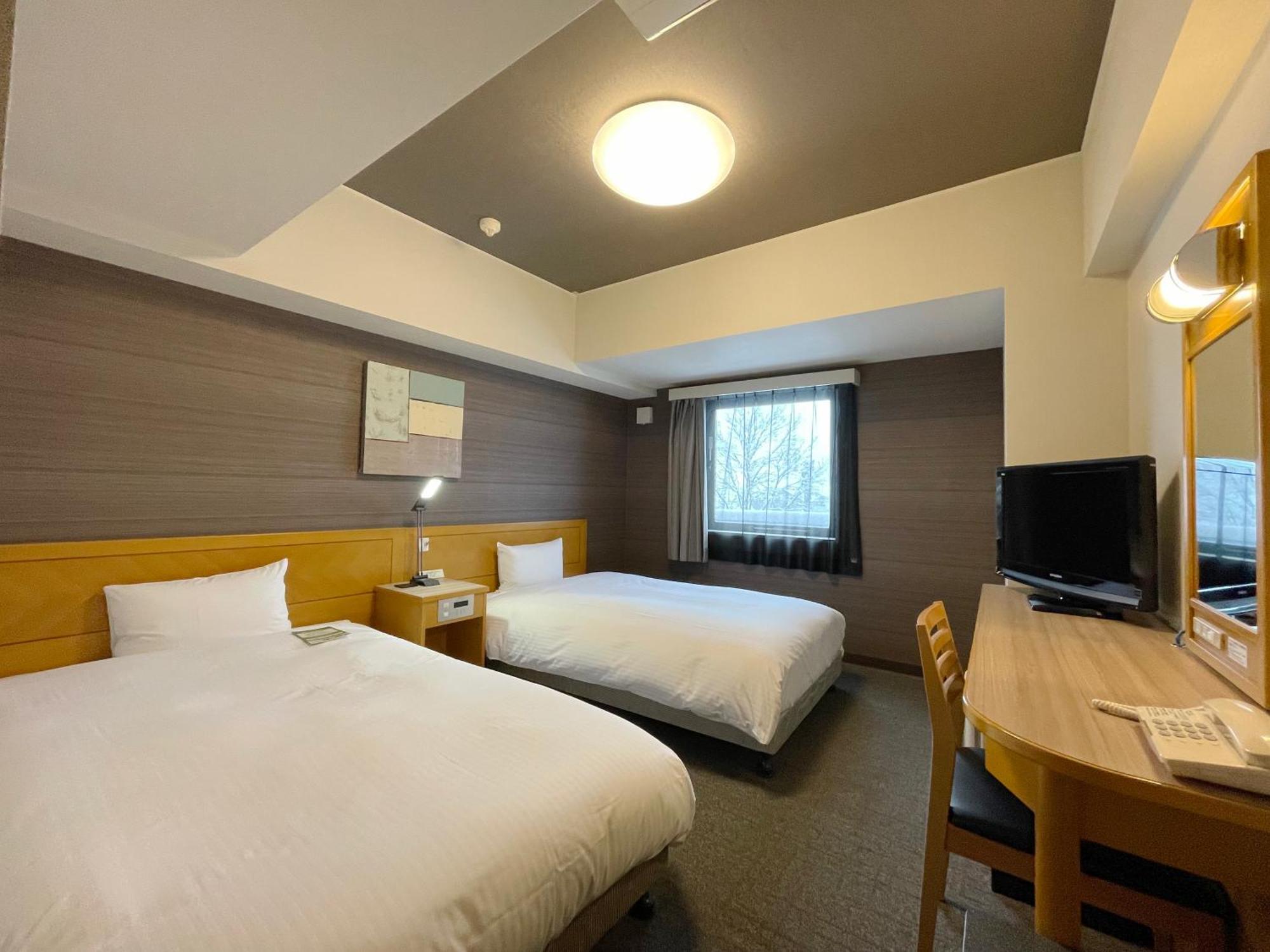 Hotel Route-Inn Yokote Inter Extérieur photo